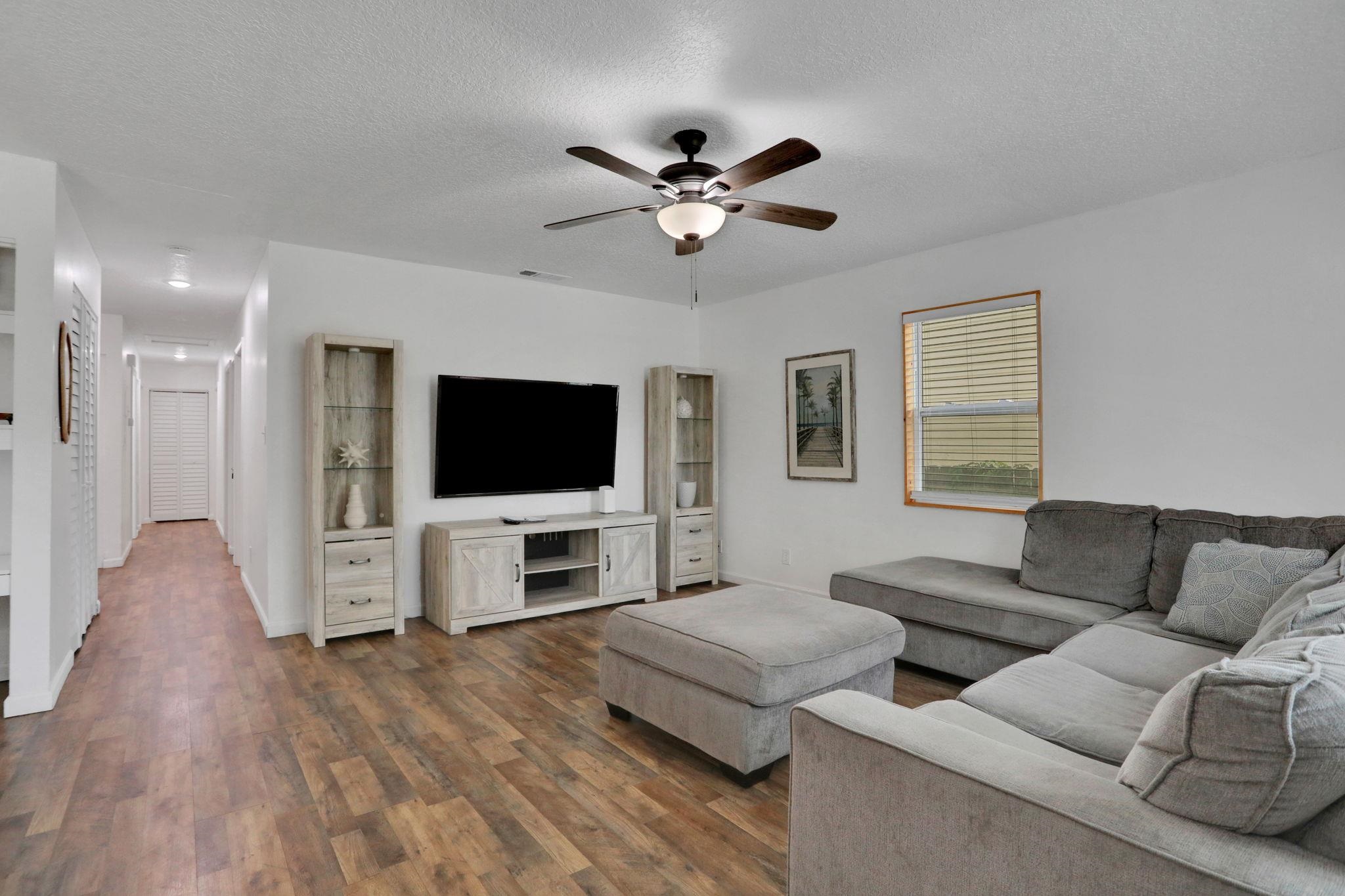 237 Riberia Street St. Augustine, FL 32084 - Photo 2 of 36 a living room with furniture and a flat screen tv