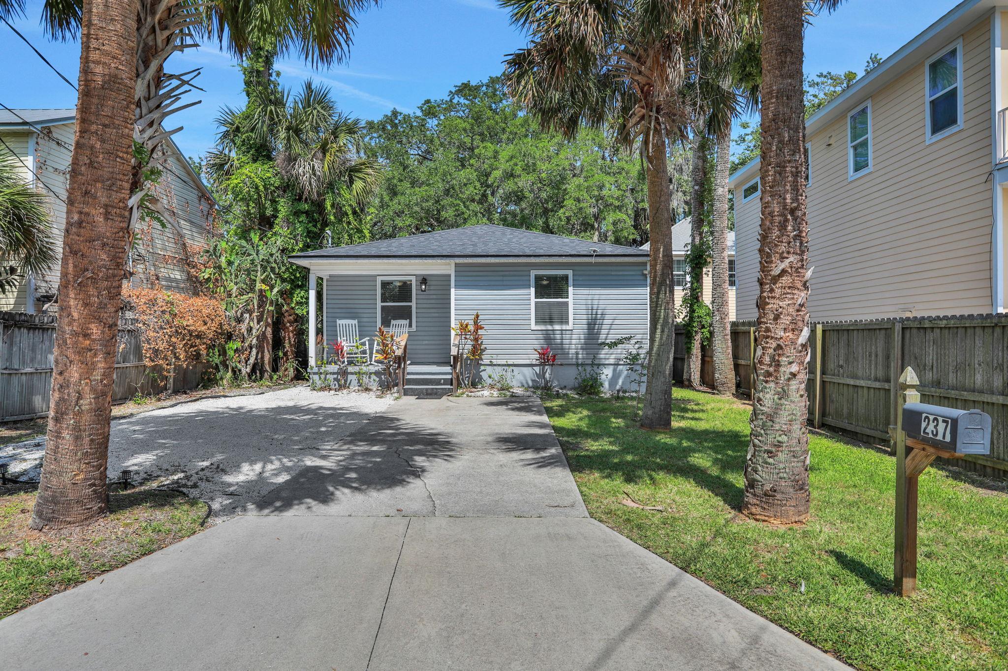 237 Riberia Street St. Augustine, FL 32084 - Photo 36 of 36 a view of a house with backyard and a tree