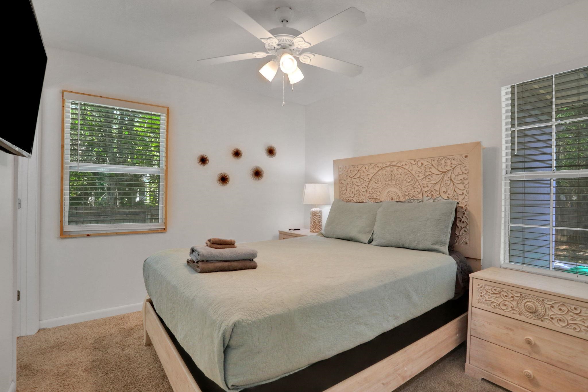 237 Riberia Street St. Augustine, FL 32084 - Photo 5 of 36 a bedroom with a bed and a window