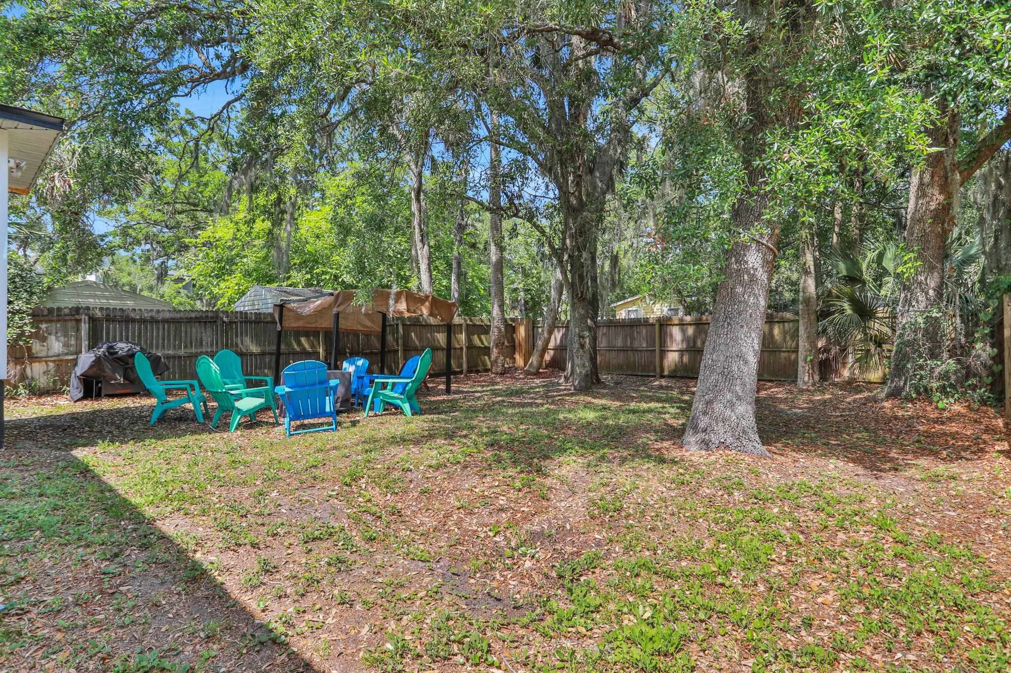 237 Riberia Street St. Augustine, FL 32084 - Photo 6 of 36 a view of a house with backyard and a tree