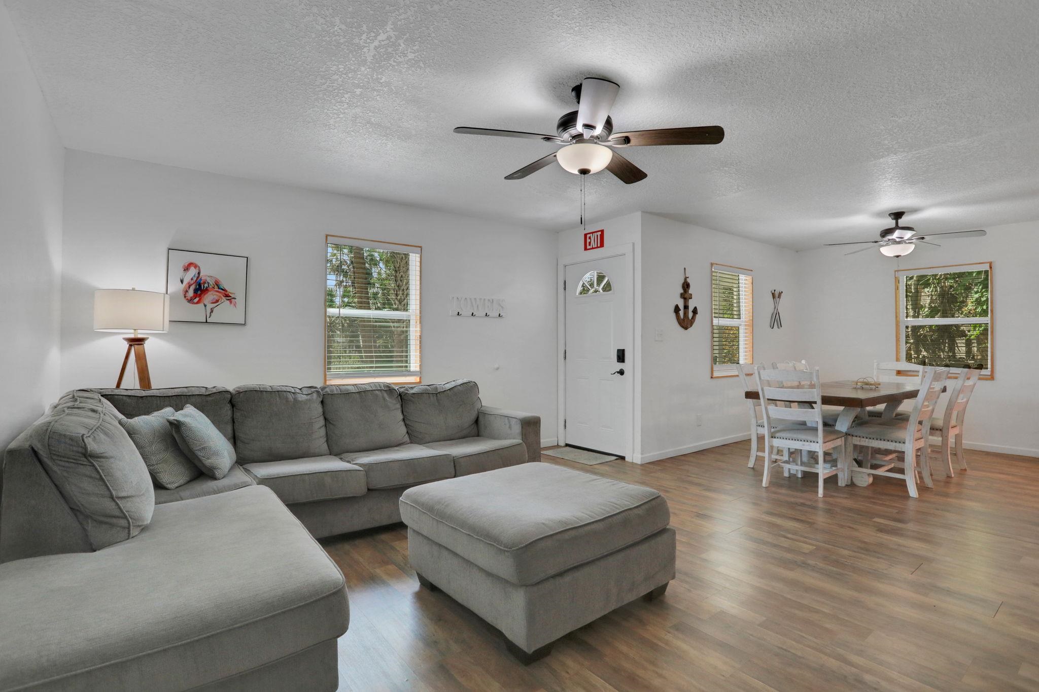 237 Riberia Street St. Augustine, FL 32084 - Photo 9 of 36 a living room with furniture and a wooden floor