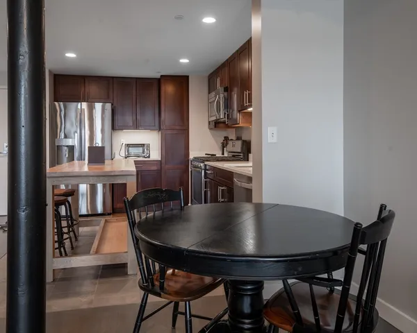 a view of a dining room with furniture