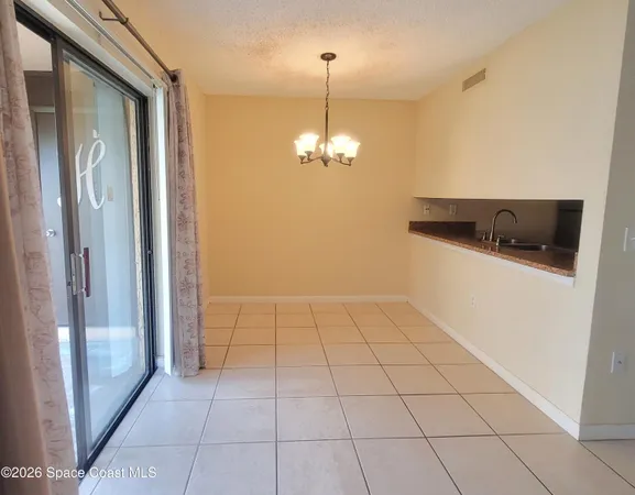 a view of a livingroom with a chandelier