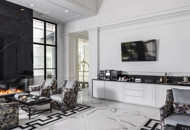 a kitchen with granite countertop a sink and a stove top oven