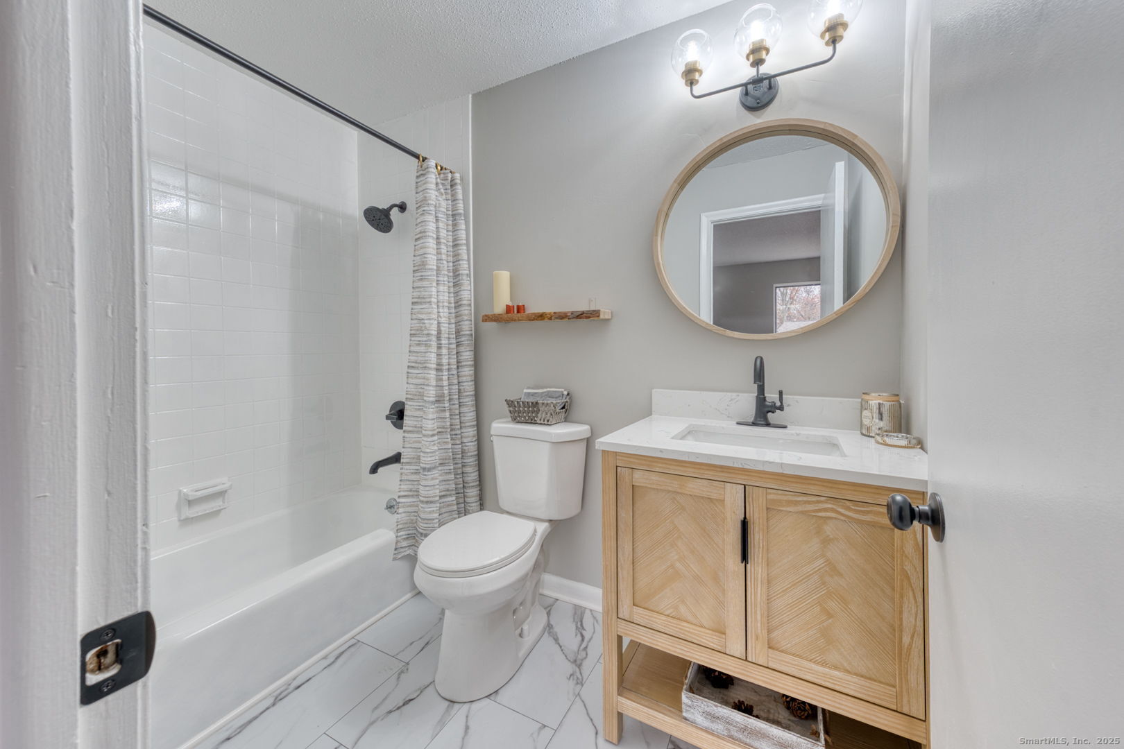 142 High Path Road, Unit 142 Windsor, CT 06095 - Photo 21 of 35 a bathroom with a sink a toilet and a mirror