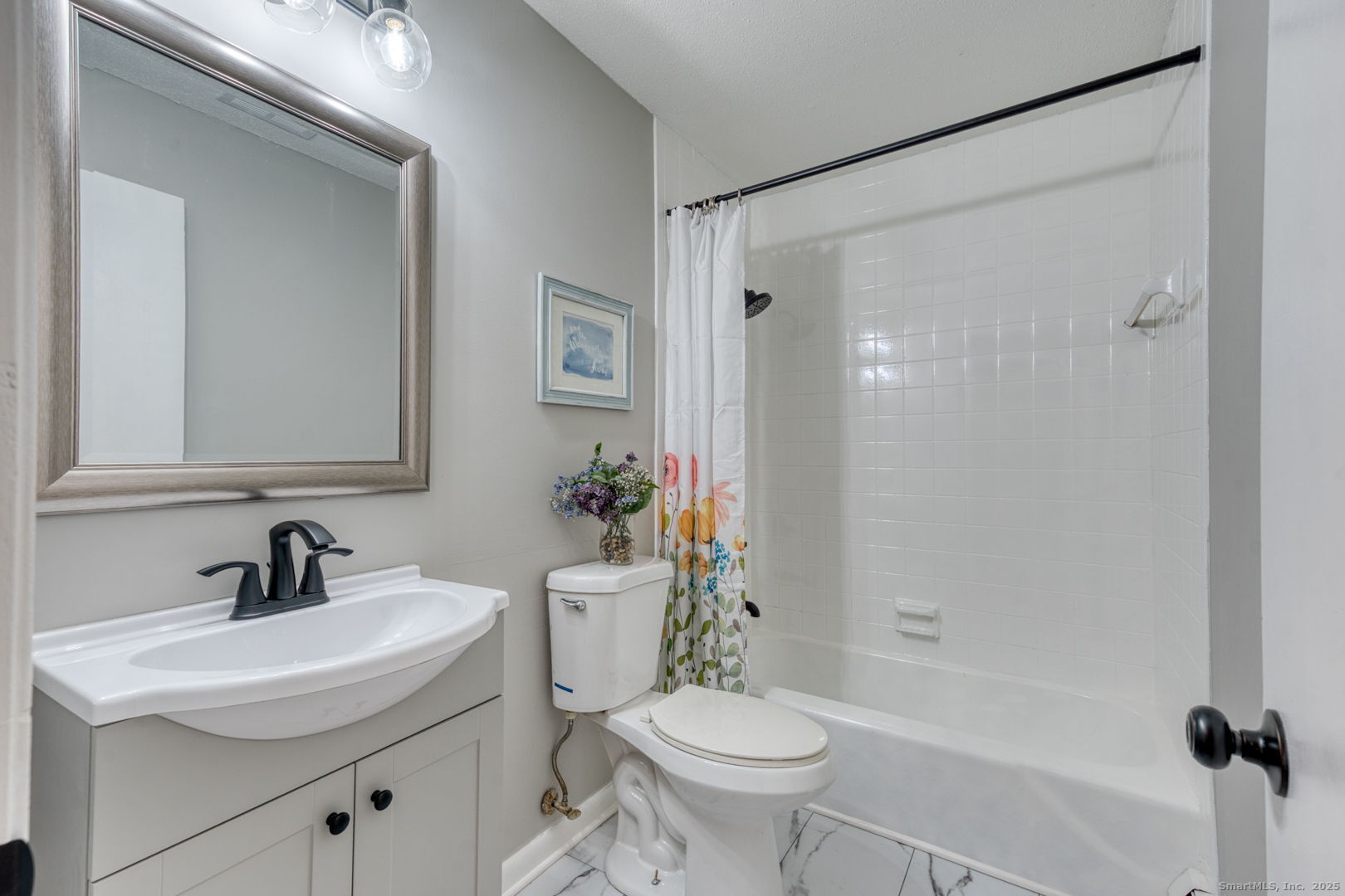 142 High Path Road, Unit 142 Windsor, CT 06095 - Photo 25 of 35 a bathroom with a sink toilet and shower