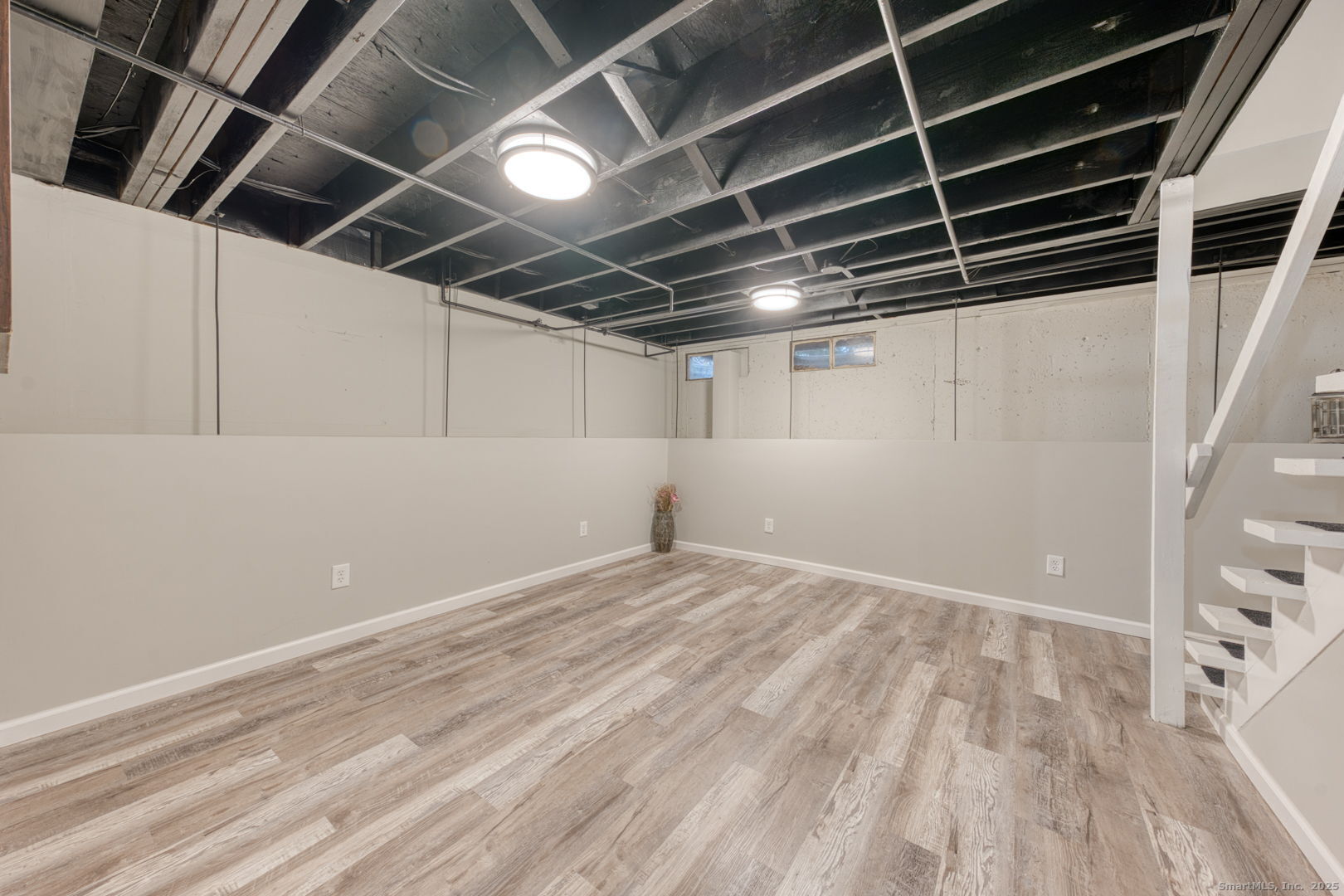 142 High Path Road, Unit 142 Windsor, CT 06095 - Photo 28 of 35 a view of empty room with wooden floor