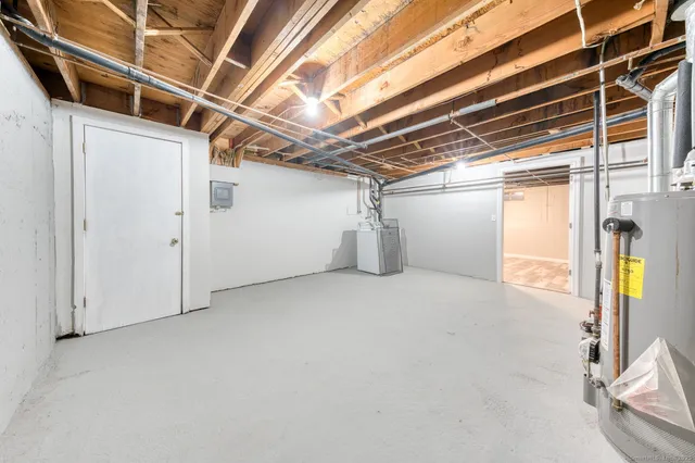 a view of empty room with wooden walls