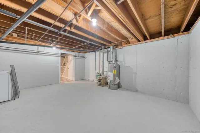 a picture of a bench in front of a wall