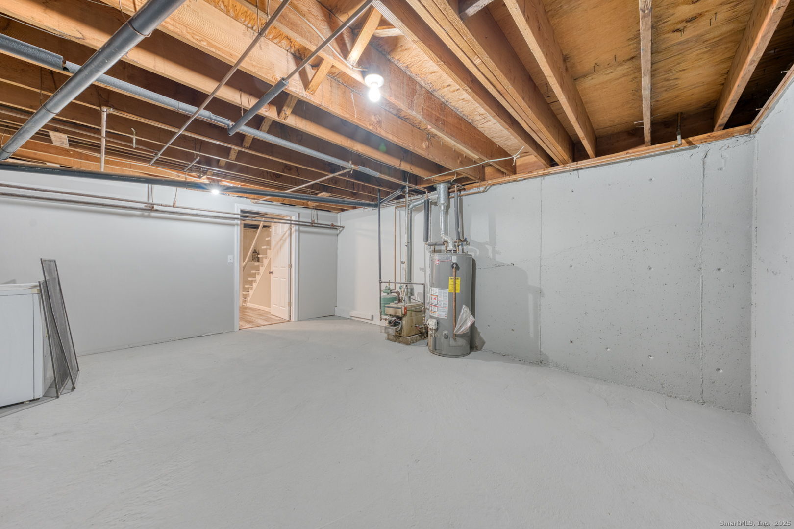 142 High Path Road, Unit 142 Windsor, CT 06095 - Photo 31 of 35 a view of empty room with wooden walls