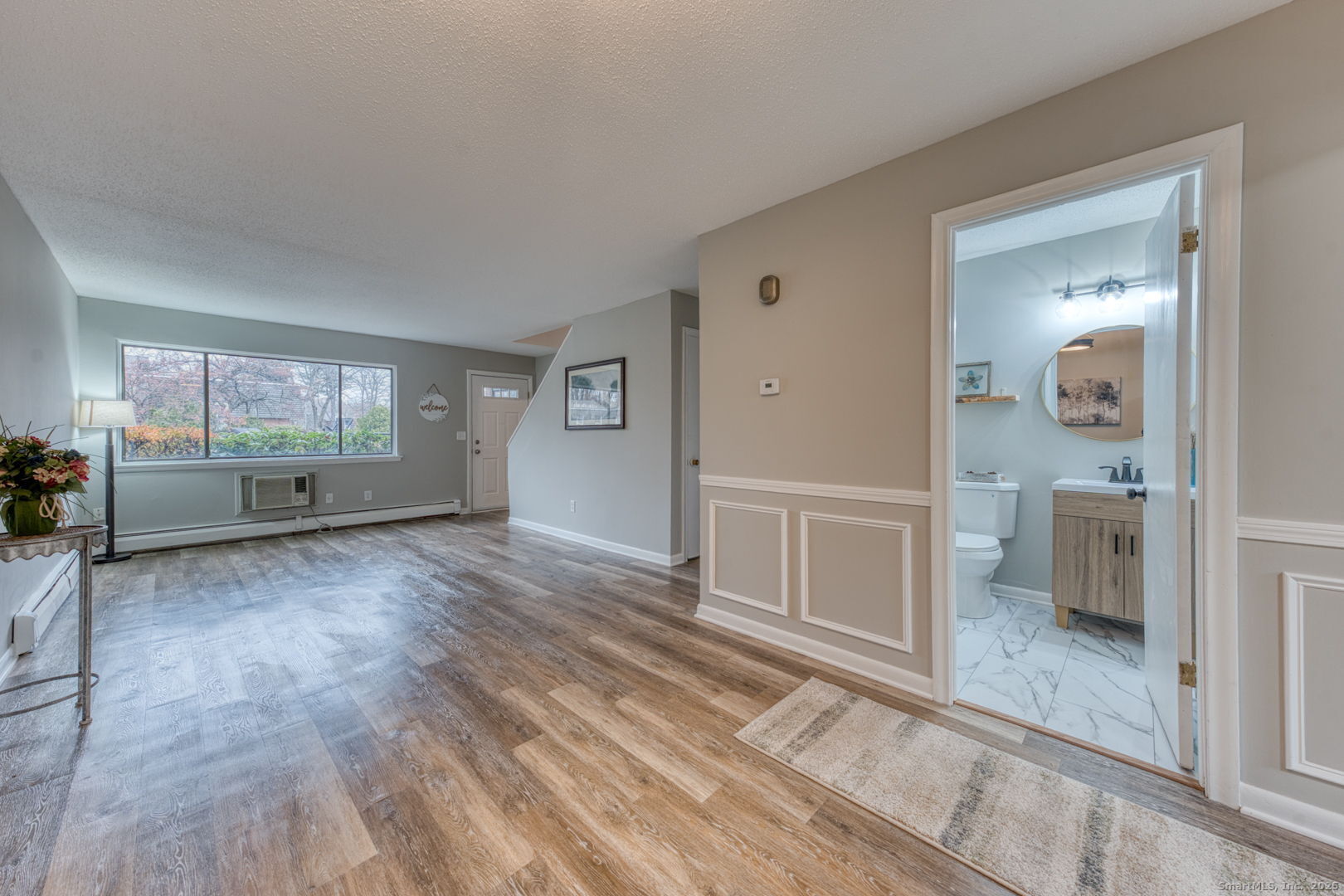 142 High Path Road, Unit 142 Windsor, CT 06095 - Photo 8 of 35 a view of an empty room and window