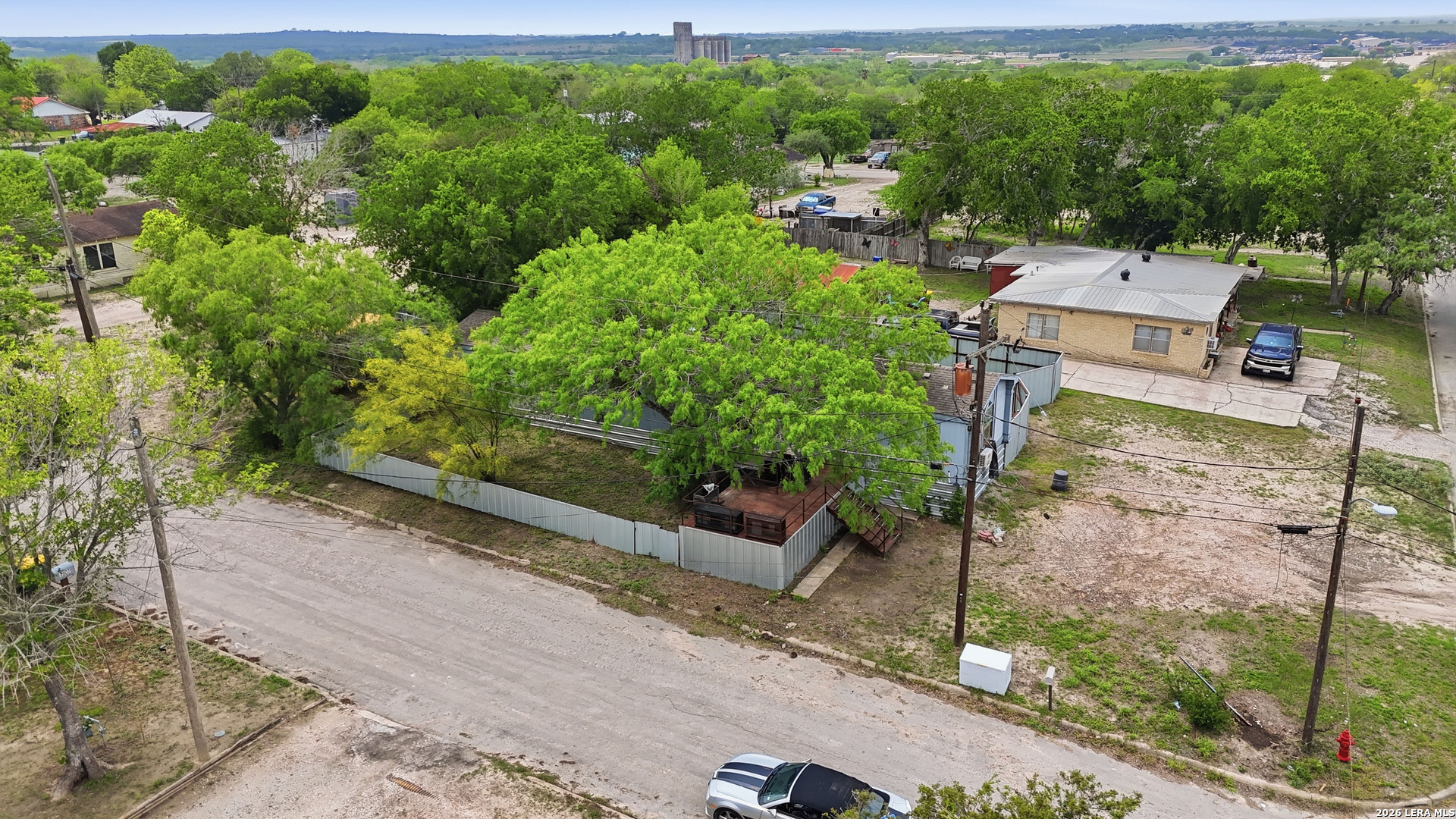 1308 Ruhmann Street Kenedy, TX 78119 - Photo 4 of 47 an aerial view of a house with a yard
