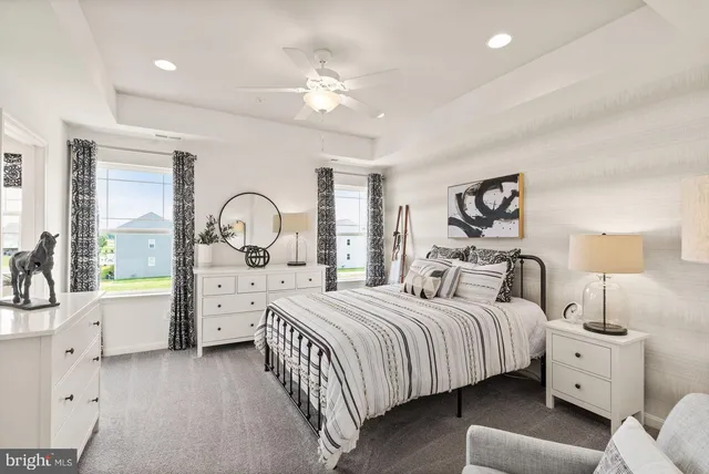a kitchen with a sink a stove and a window