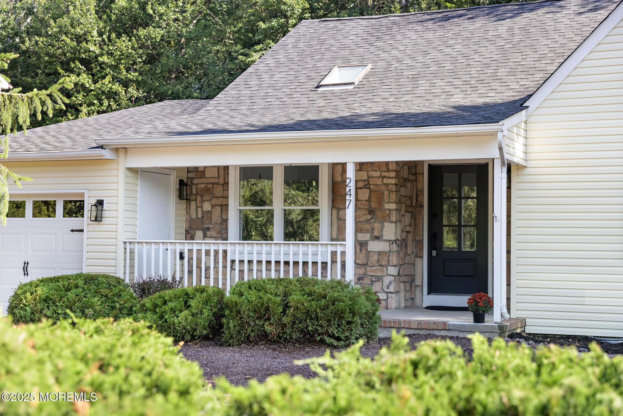 247 Jennings Road Manahawkin, NJ 08050 - Photo 2 of 35 a front view of a house with a yard
