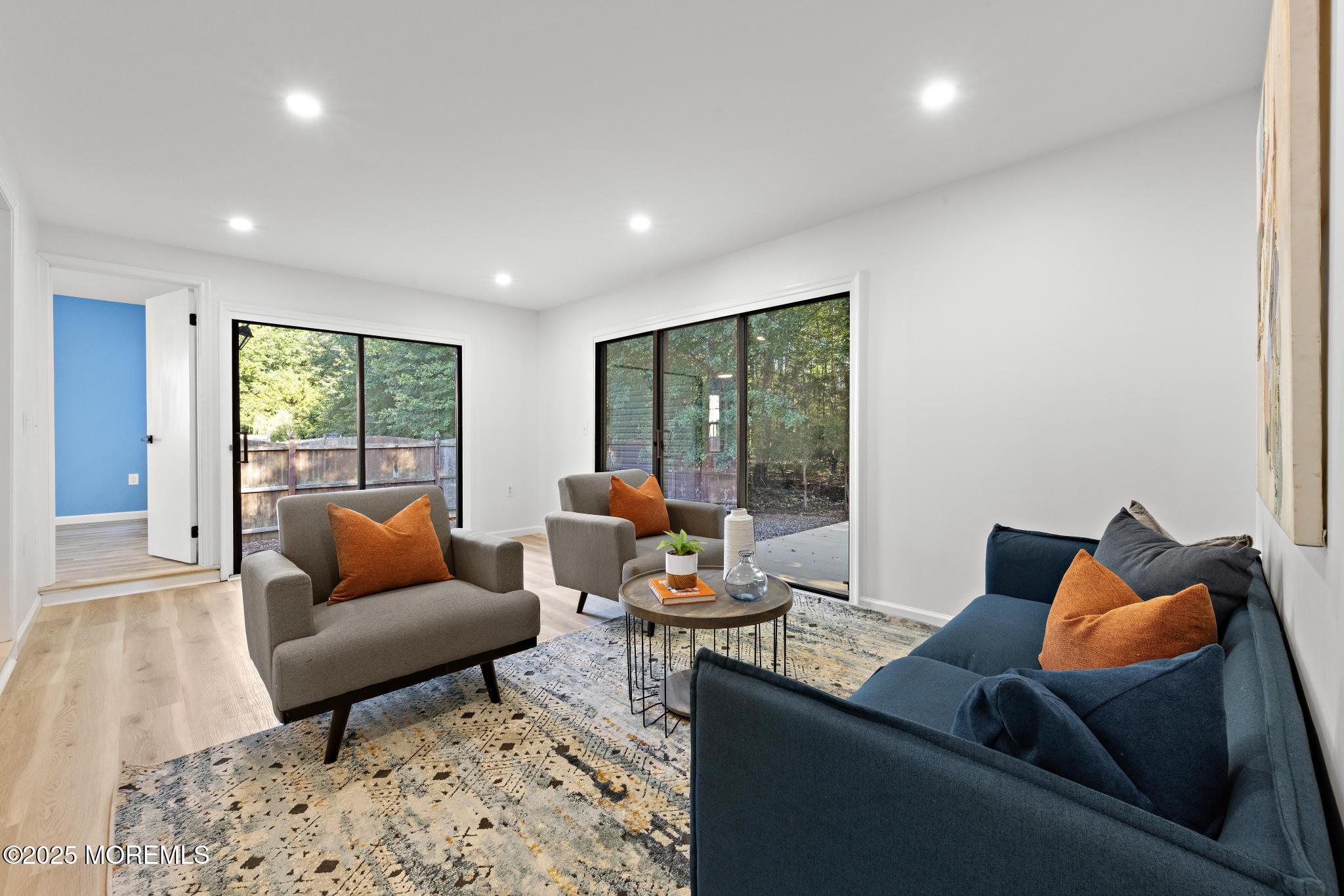 247 Jennings Road Manahawkin, NJ 08050 - Photo 21 of 35 a living room with furniture and a large window