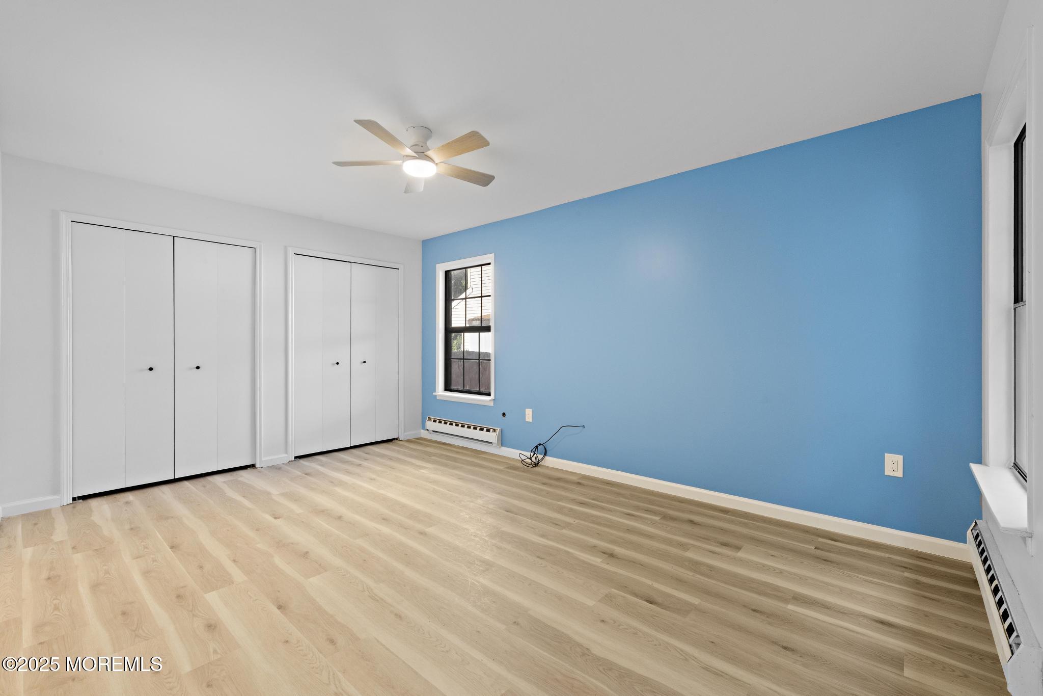 247 Jennings Road Manahawkin, NJ 08050 - Photo 27 of 35 a view of an empty room with a window