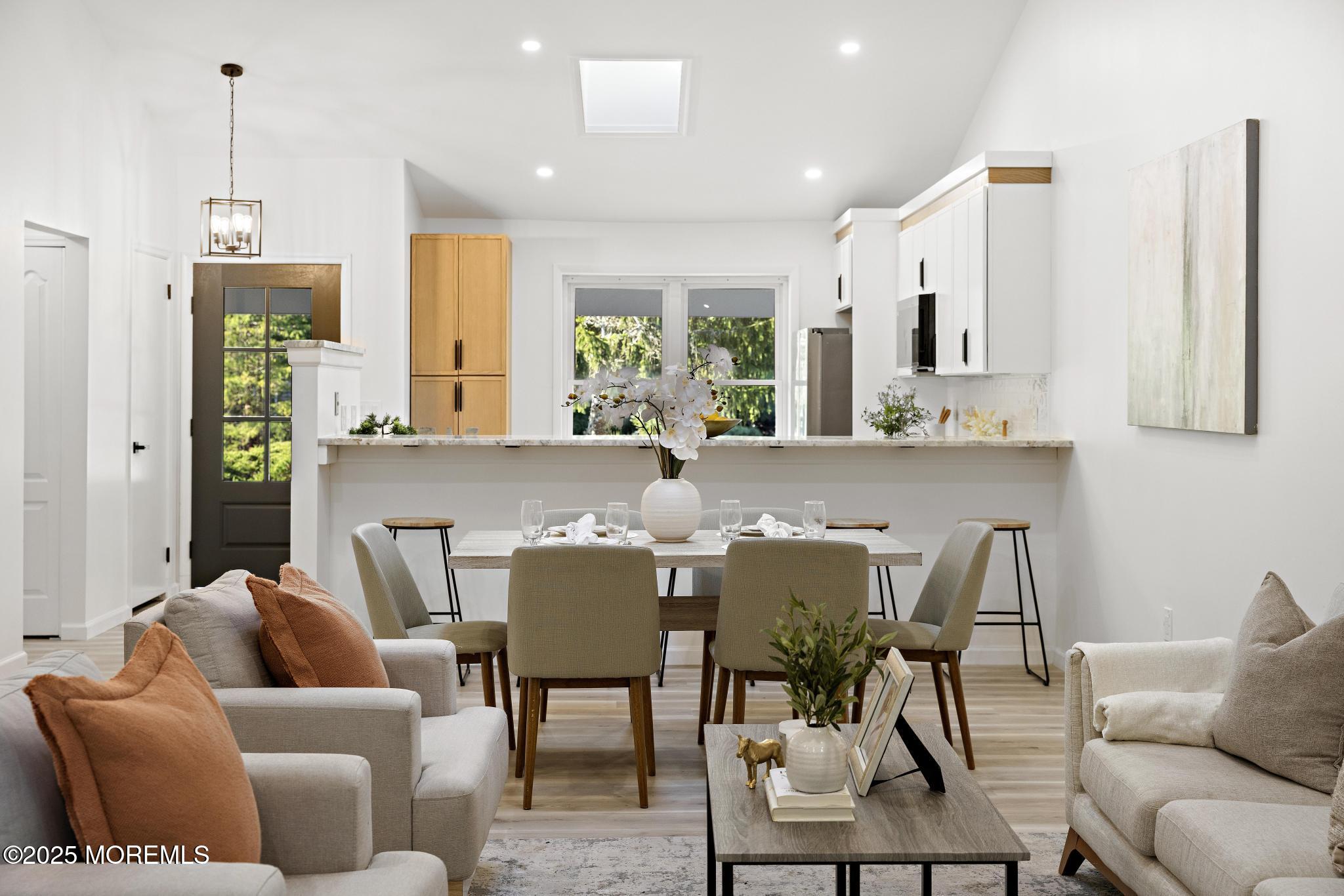 247 Jennings Road Manahawkin, NJ 08050 - Photo 4 of 35 a view of a dining room with furniture
