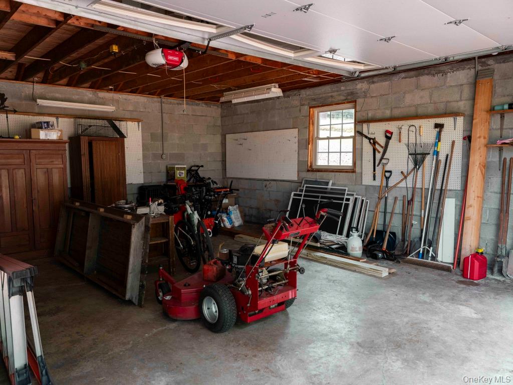 284 Ridge Road Hamden, NY 13782 - Photo 28 of 44 Clean and dry 2-car garage with added loft storage above