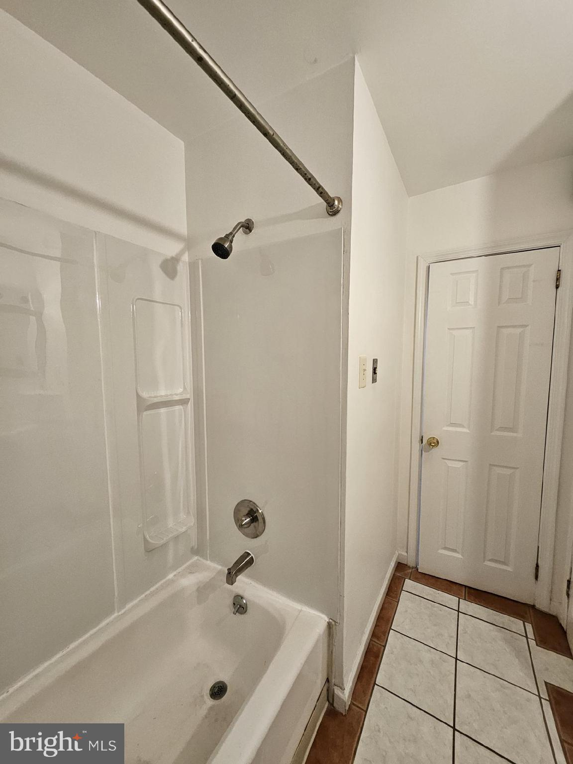 185 Edge Avenue New Castle, DE 19720 - Photo 5 of 7 a bathroom with a tub and shower