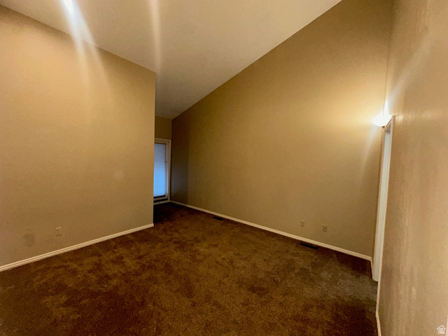 1715 Darling Street, Unit 3 Ogden, UT 84403 - Photo 13 of 26 Spacious master on main level featuring vaulted ceilings