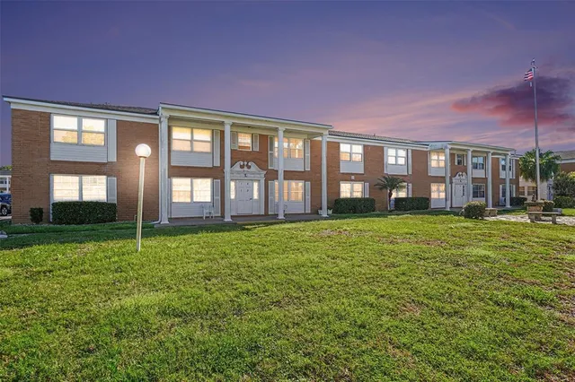 a house view with a garden space