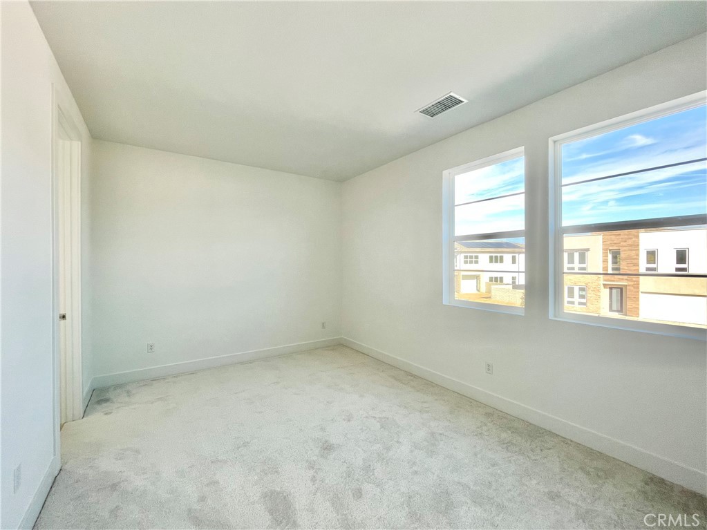 27557 Elderberry Drive Valencia, CA 91381 - Photo 29 of 39 an empty room with a window