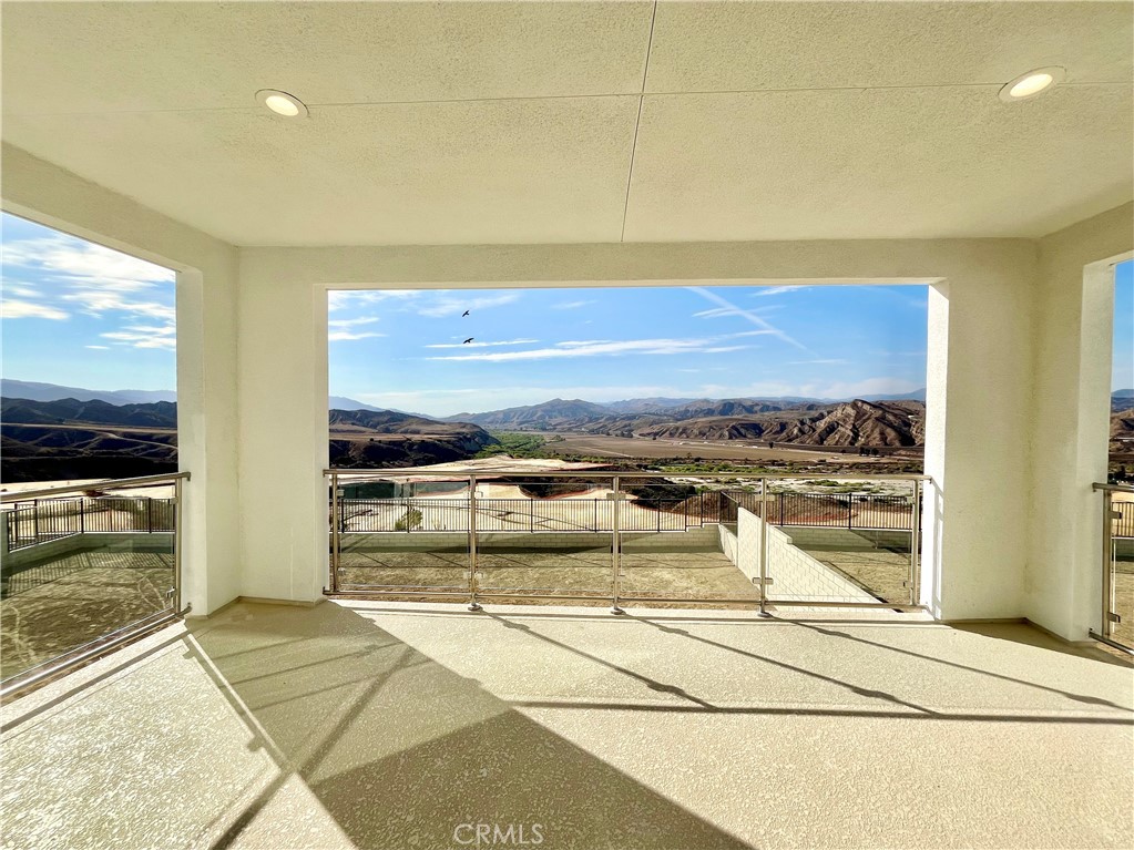 27557 Elderberry Drive Valencia, CA 91381 - Photo 35 of 39 a view of a balcony area and a floor to ceiling window
