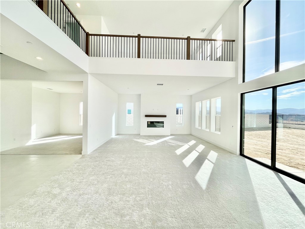 27557 Elderberry Drive Valencia, CA 91381 - Photo 4 of 39 a view of an entryway with wooden floor