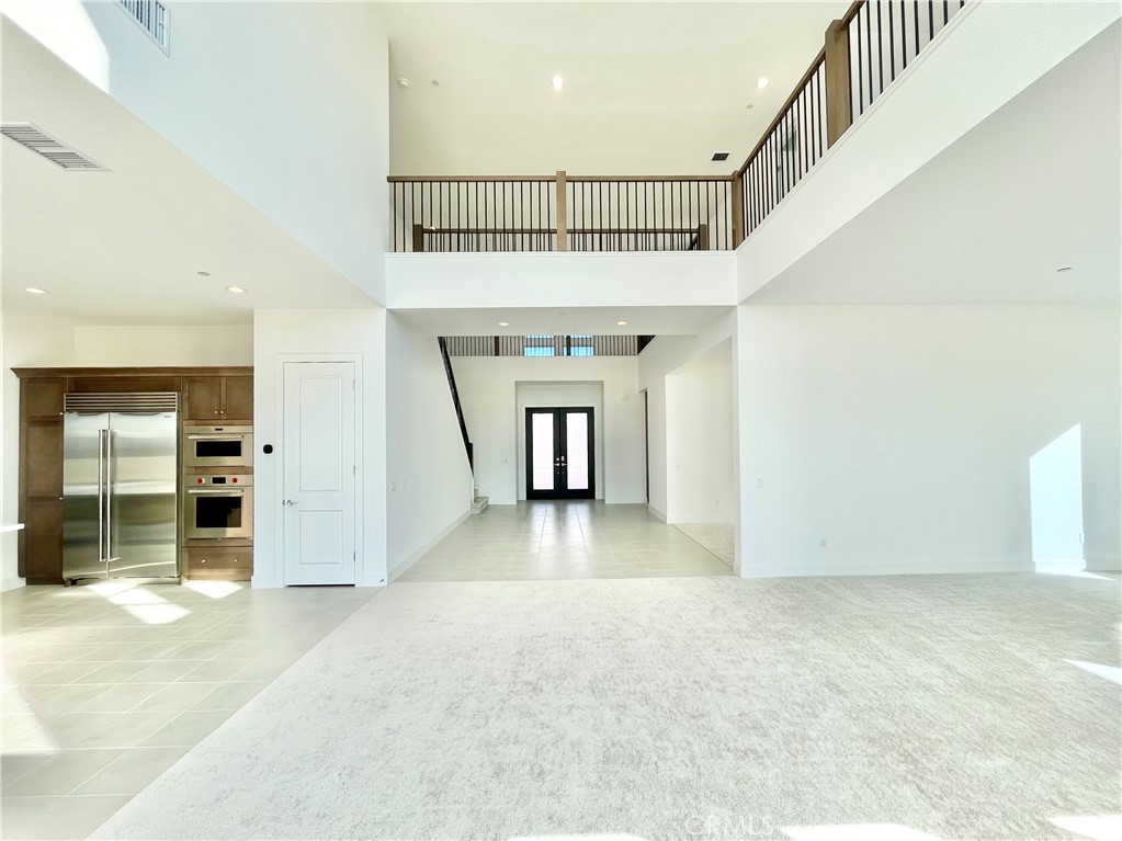 27557 Elderberry Drive Valencia, CA 91381 - Photo 10 of 39 a view of a hallway view with staircase