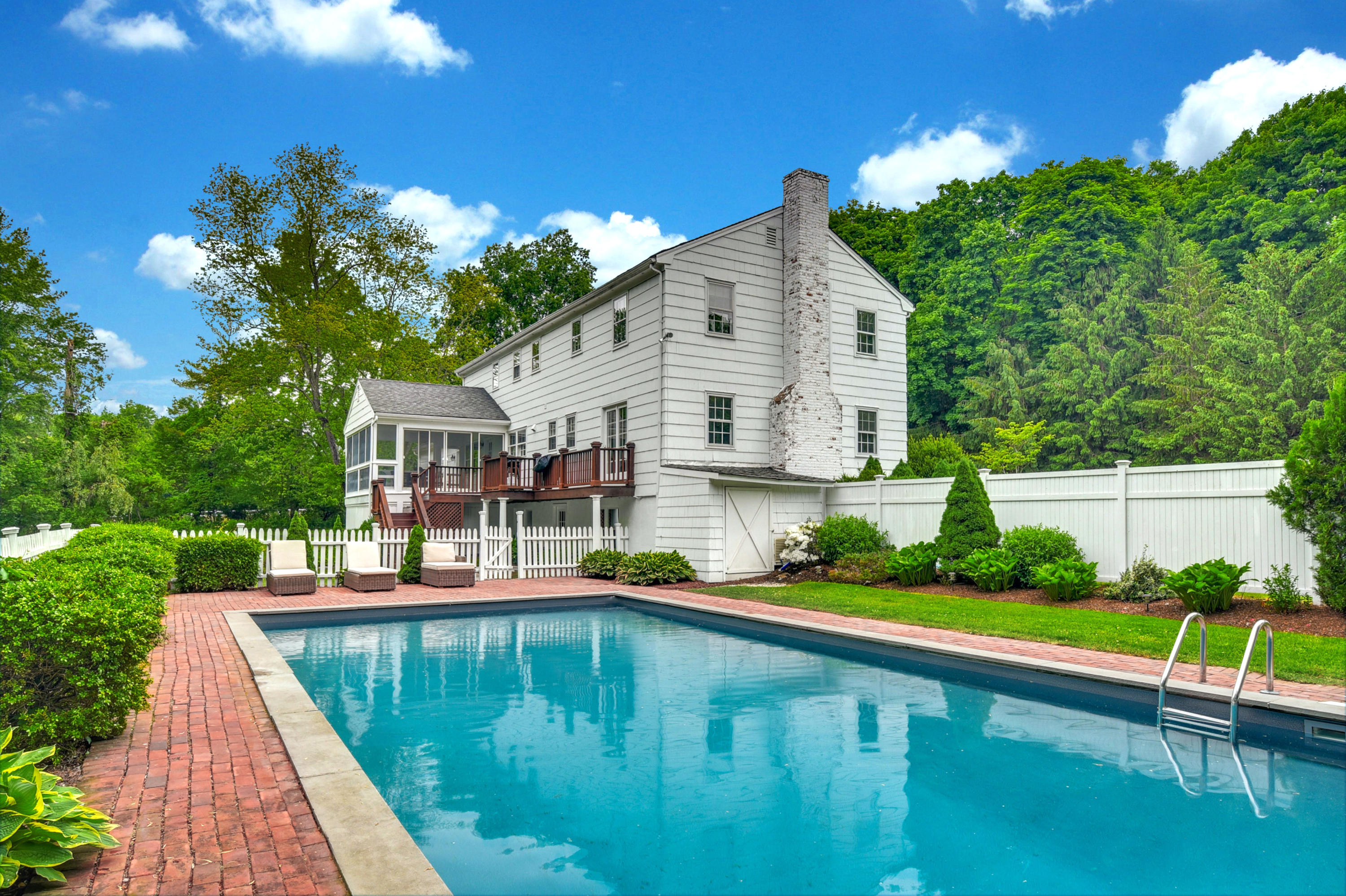 451 Middlesex Road Darien, CT 06820 - Photo 35 of 40 a view of a house with swimming pool