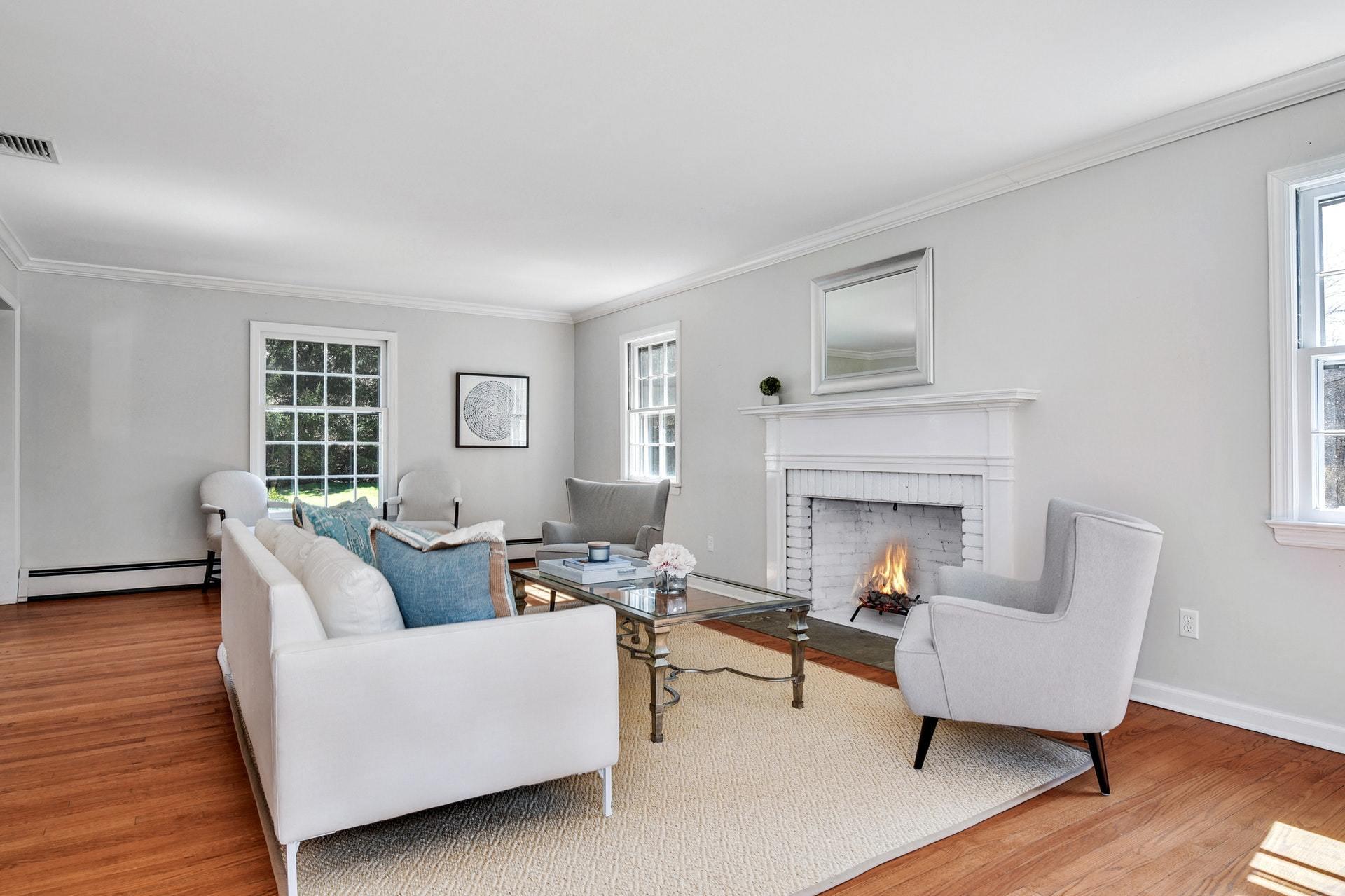 451 Middlesex Road Darien, CT 06820 - Photo 7 of 40 a living room with furniture and a fireplace