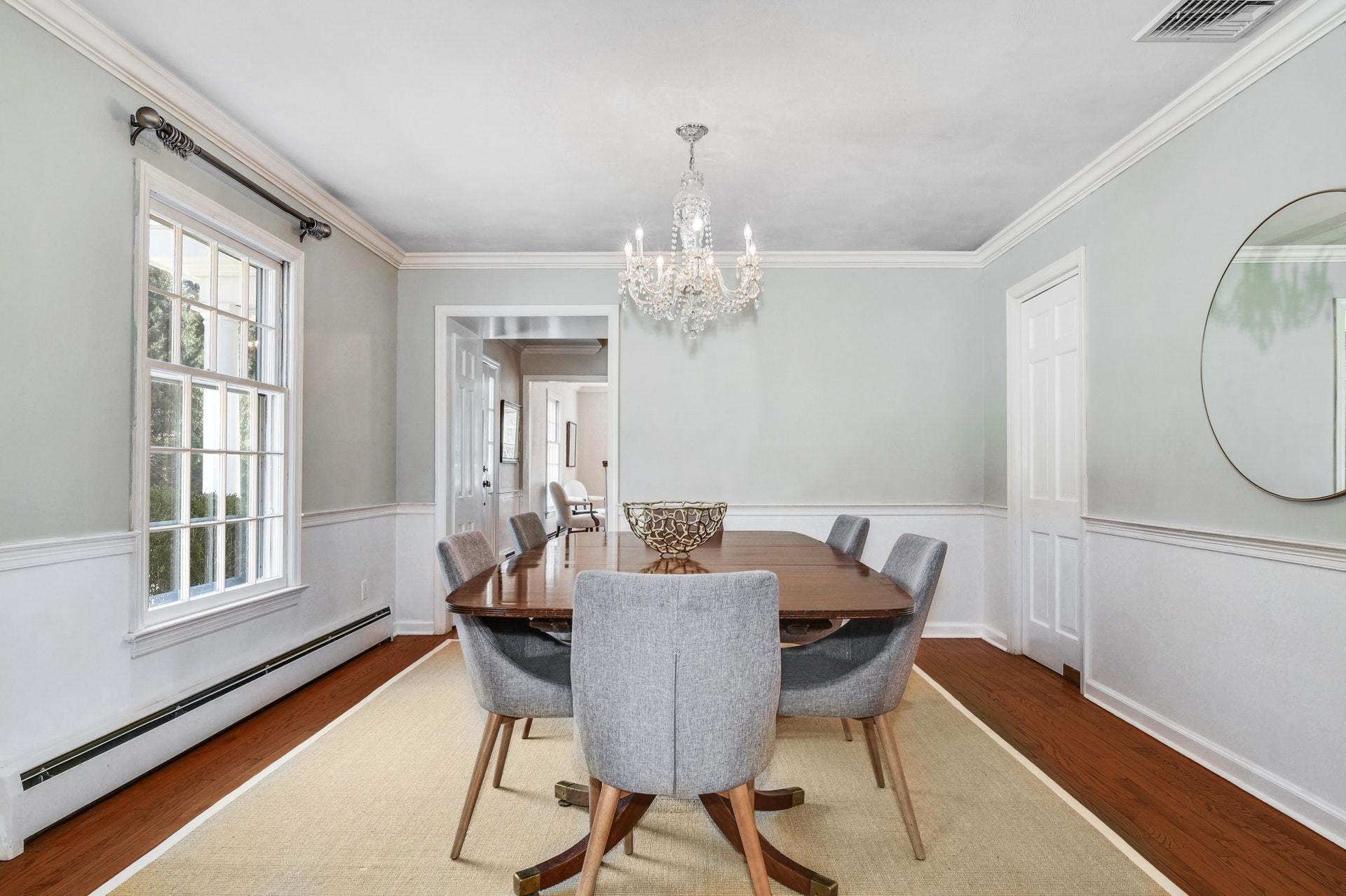 451 Middlesex Road Darien, CT 06820 - Photo 10 of 40 a view of a dining room with furniture window and wooden floor