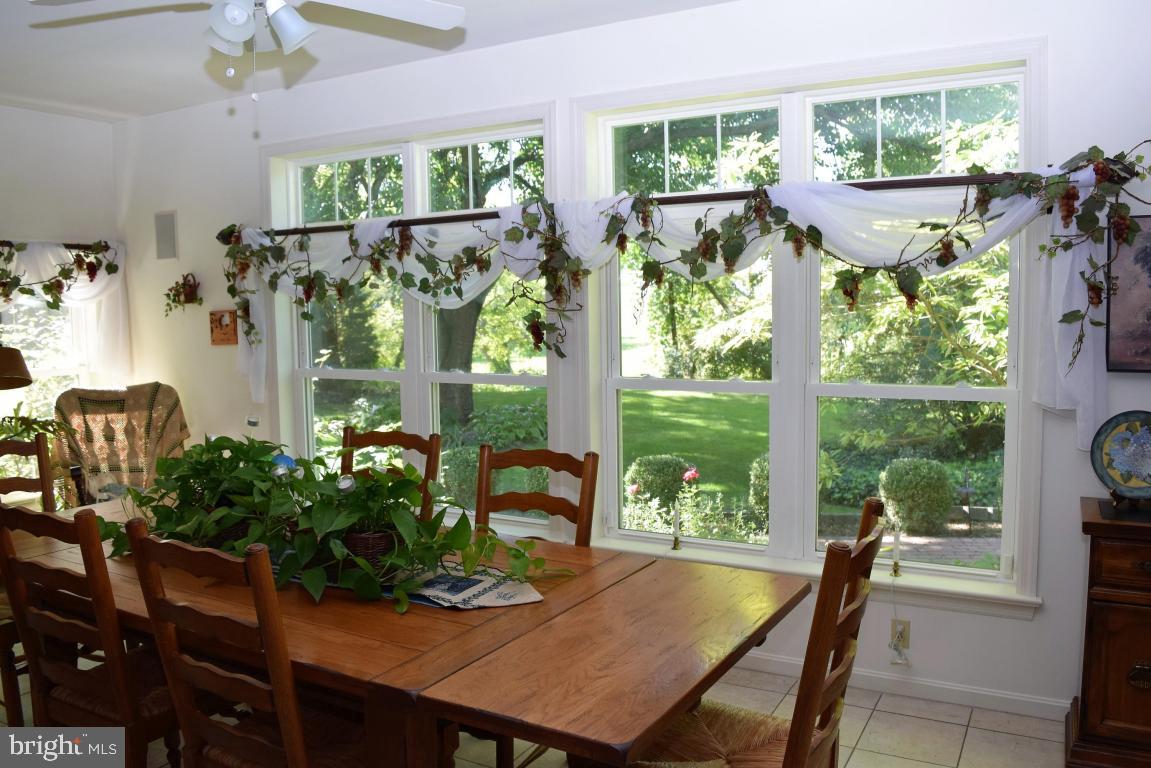 1416 Oregon Road Leola, PA 17540 - Photo 14 of 59 a view of a dining room with furniture window and outside view