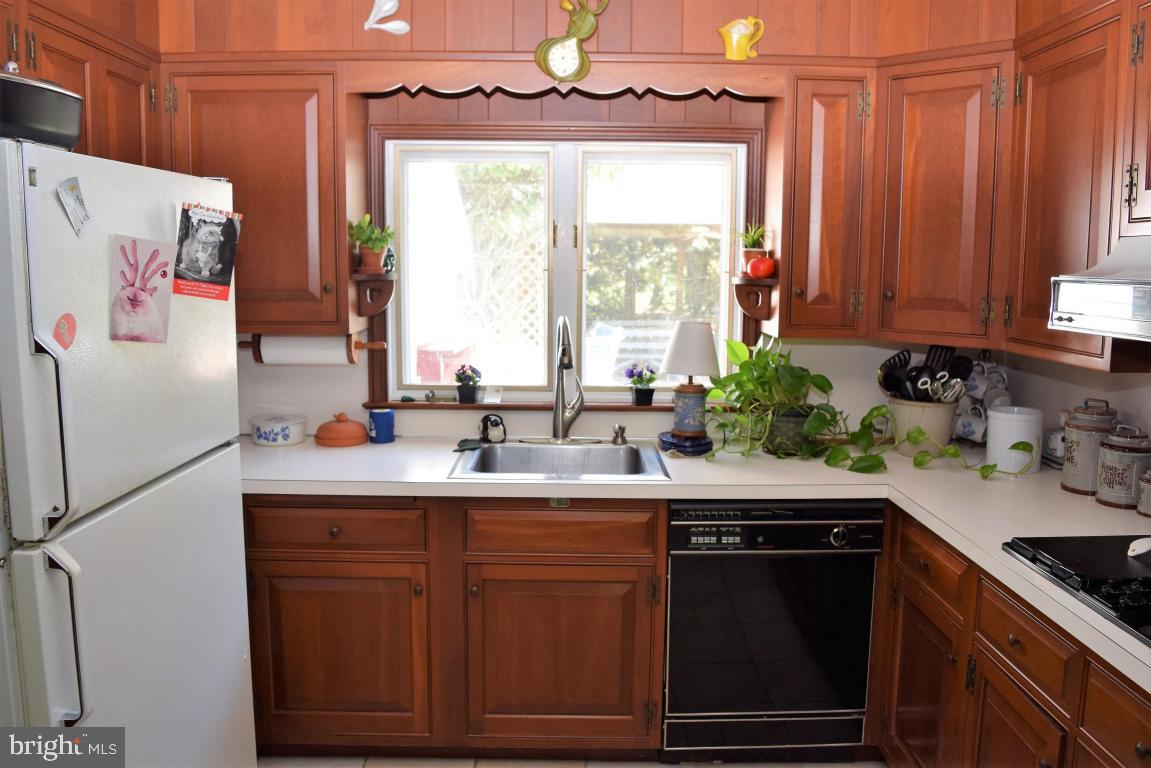 1416 Oregon Road Leola, PA 17540 - Photo 8 of 59 a kitchen with stainless steel appliances a sink a stove and a refrigerator