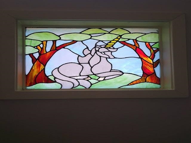 1435 East Holmes Road Memphis, TN 38116 - Photo 24 of 25 a room that has a rug and a painting on the wall