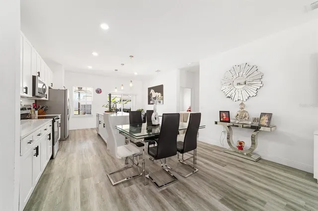a view of a dining room with furniture