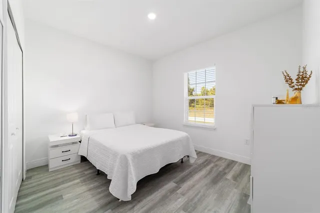 a view of a swimming pool with an outdoor seating