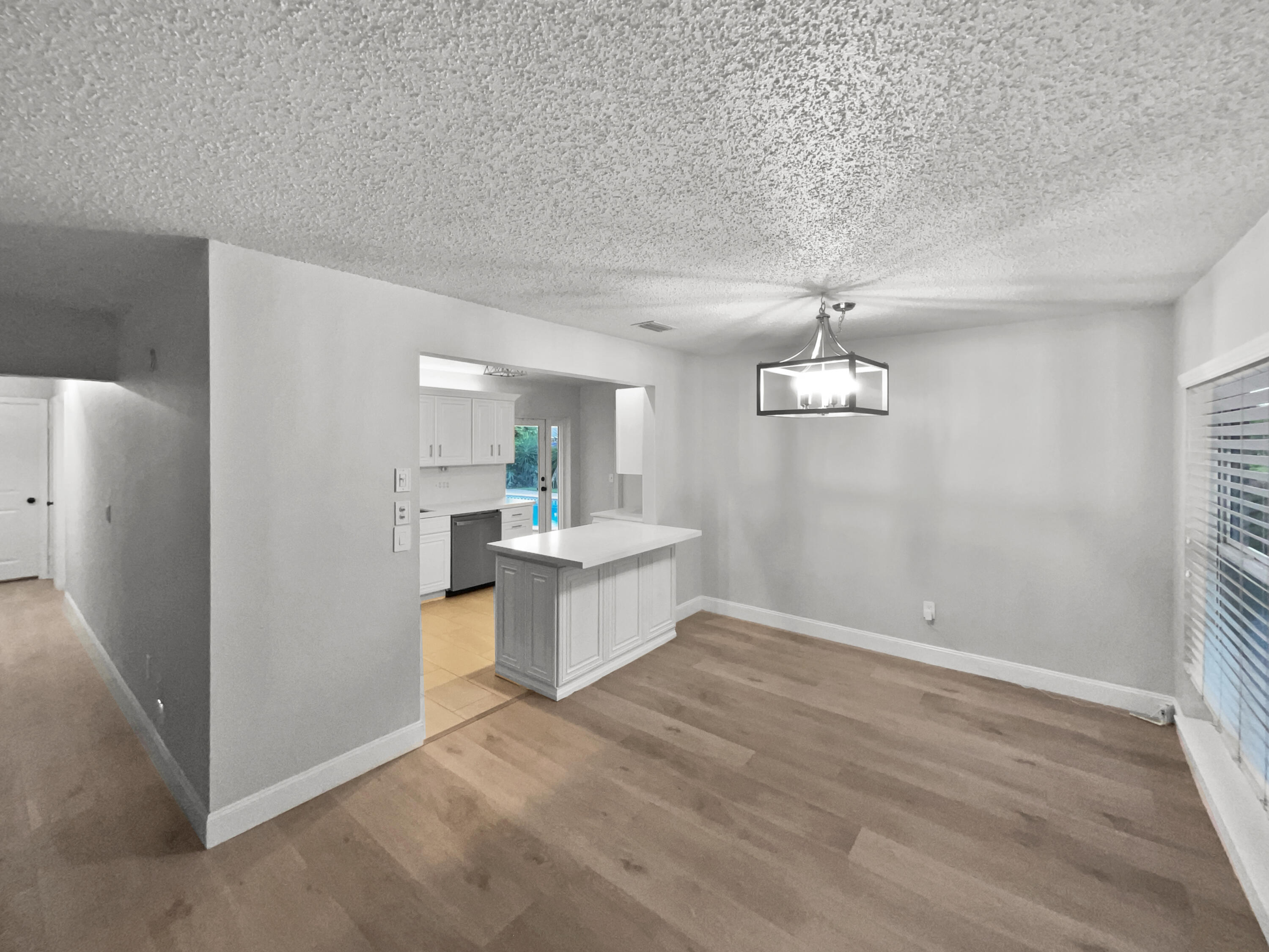 22226 Southwest 65th Terrace Boca Raton, FL 33428 - Photo 11 of 27 a view of a kitchen with sink refrigerator and window