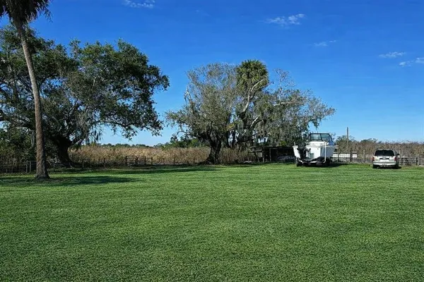 a fire hydrant in the middle of a field