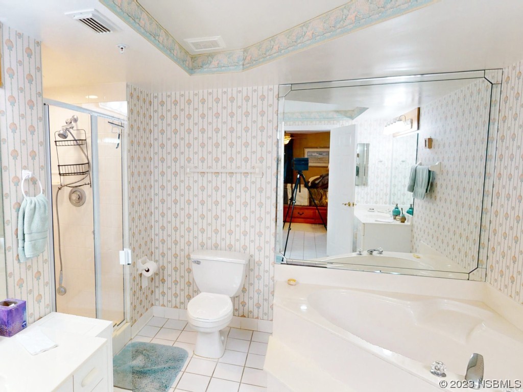 4555 South Atlantic Avenue, Unit 4502 Ponce Inlet, FL 32127 - Photo 28 of 54 a bathroom with a bathtub and a sink