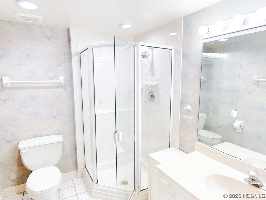 4555 South Atlantic Avenue, Unit 4502 Ponce Inlet, FL 32127 - Photo 35 of 54 a bathroom with a toilet sink and shower