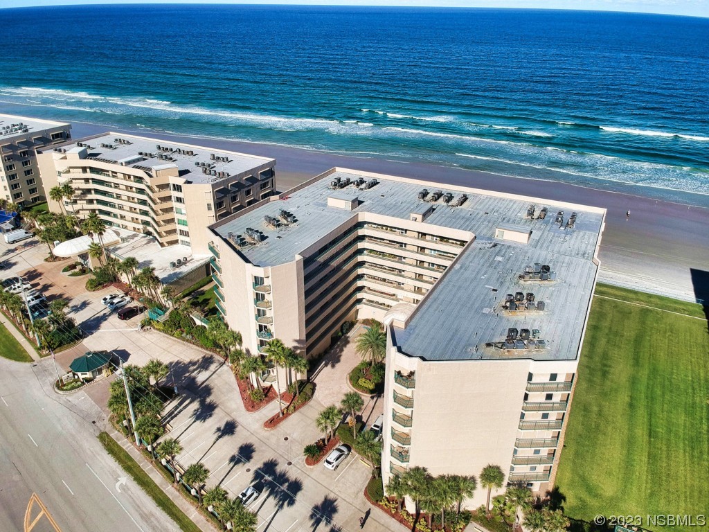 4555 South Atlantic Avenue, Unit 4502 Ponce Inlet, FL 32127 - Photo 40 of 54 an aerial view of a house with a garden