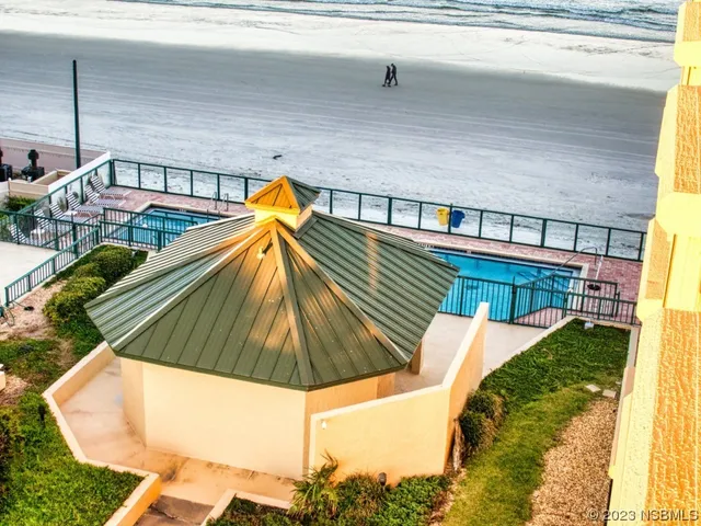 a view of an outdoor space and tennis court