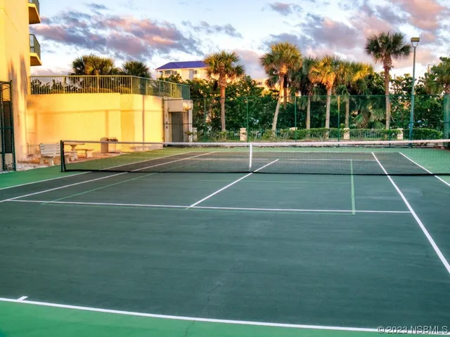 a view of swimming pool from a balcony