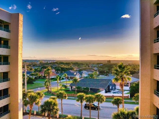 a view of swimming pool with a yard