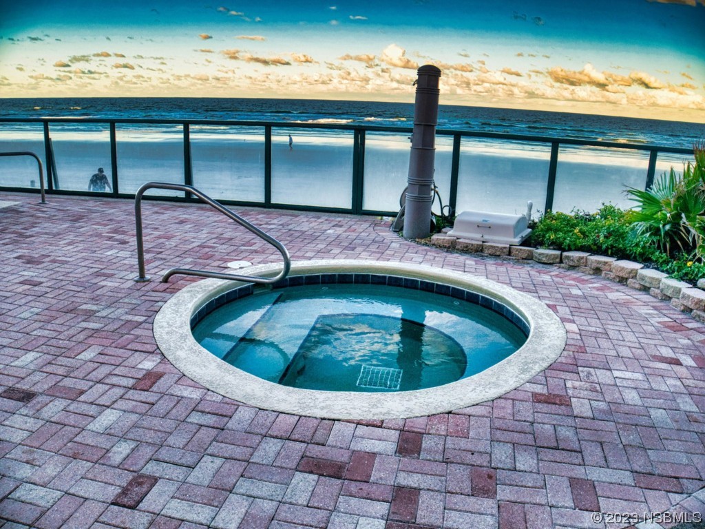 4555 South Atlantic Avenue, Unit 4502 Ponce Inlet, FL 32127 - Photo 49 of 54 a view of swimming pool with a yard