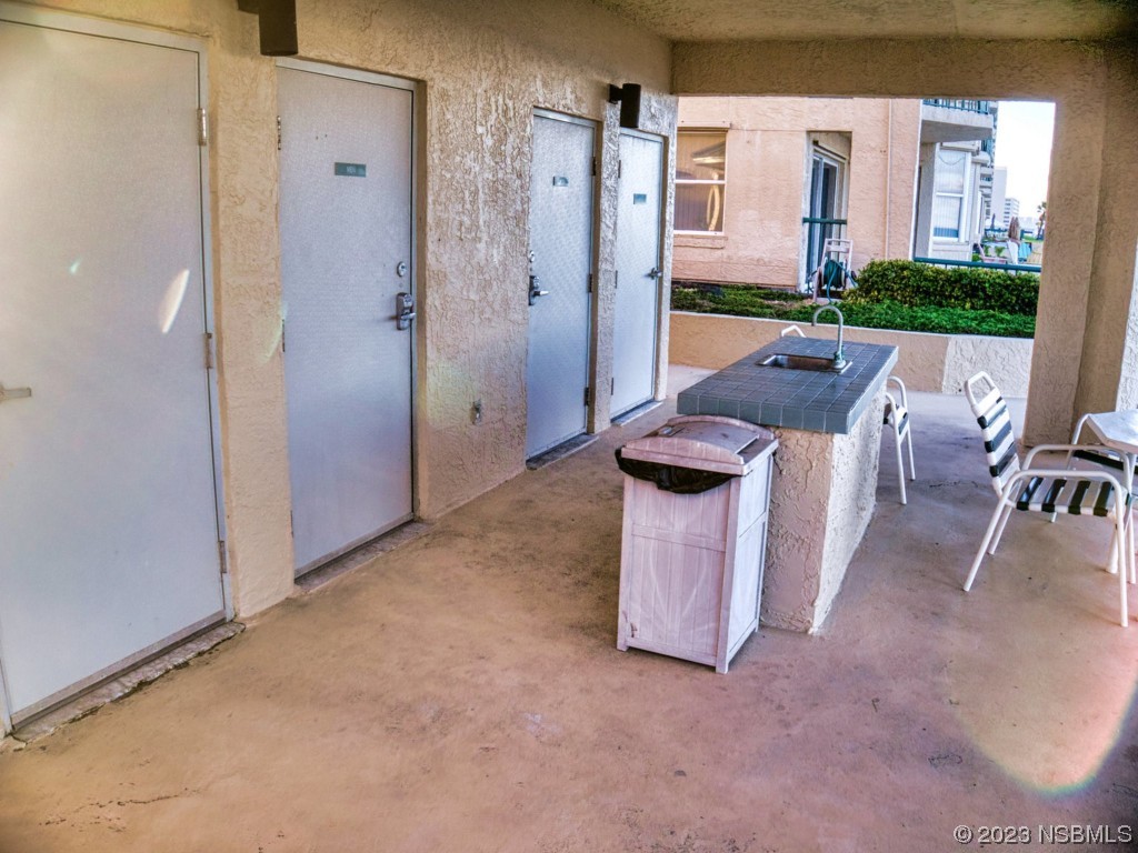 4555 South Atlantic Avenue, Unit 4502 Ponce Inlet, FL 32127 - Photo 50 of 54 wooden floor and dining room with furniture