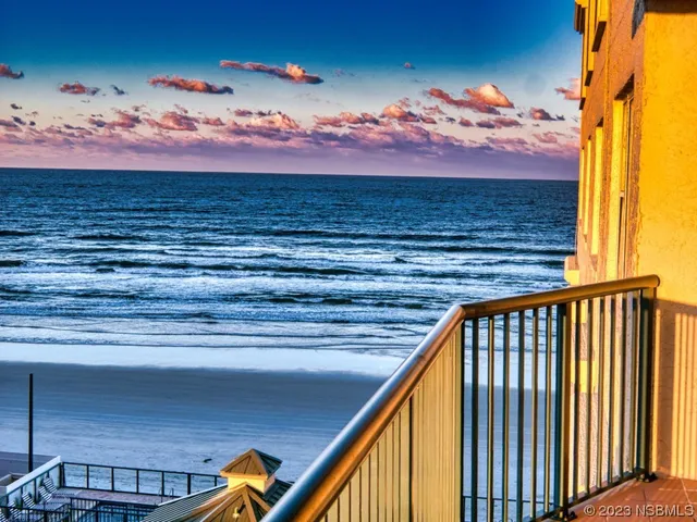 a view of a balcony with a swing