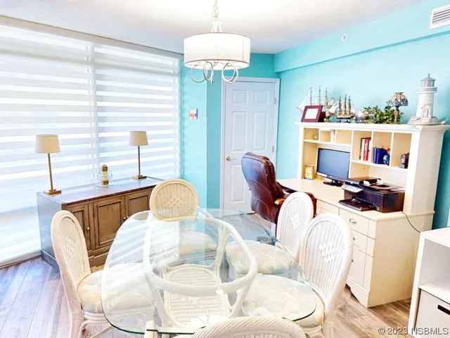 a view of a dining room with furniture