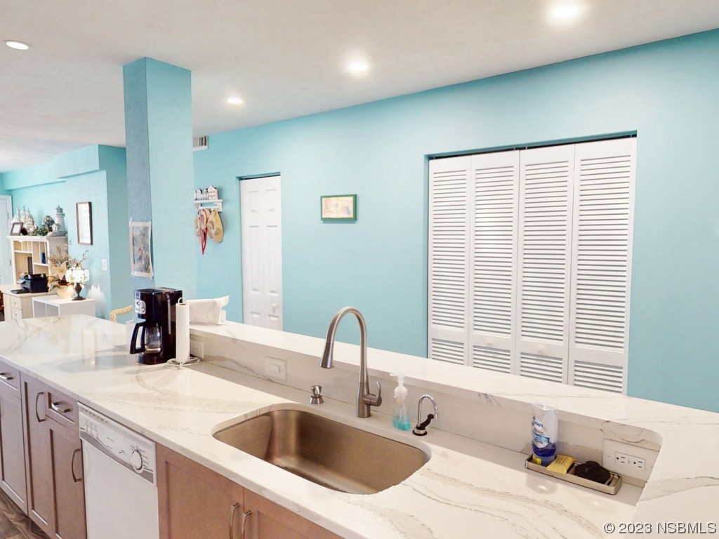 4555 South Atlantic Avenue, Unit 4502 Ponce Inlet, FL 32127 - Photo 9 of 54 a bathroom with a sink and a window